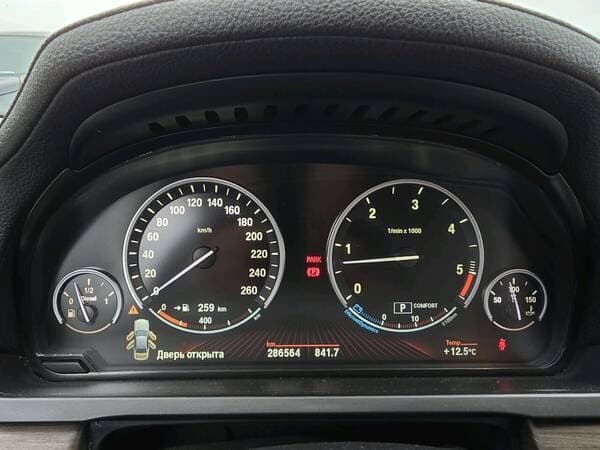 BMW 740 2010 — Миниатюра 10