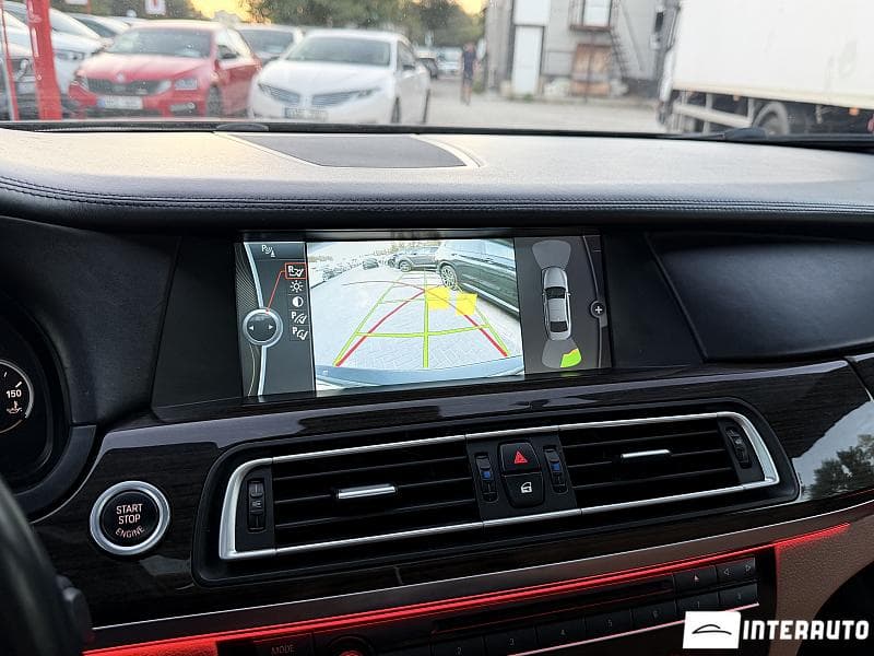 BMW 730 2011 — Миниатюра 11