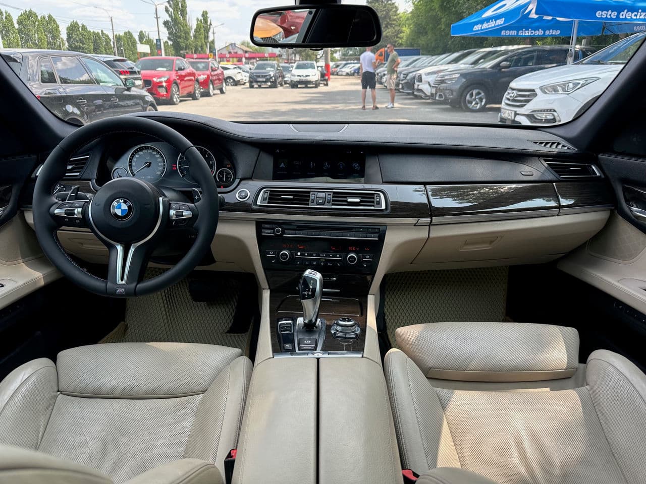 BMW 740 2011 — Миниатюра 10