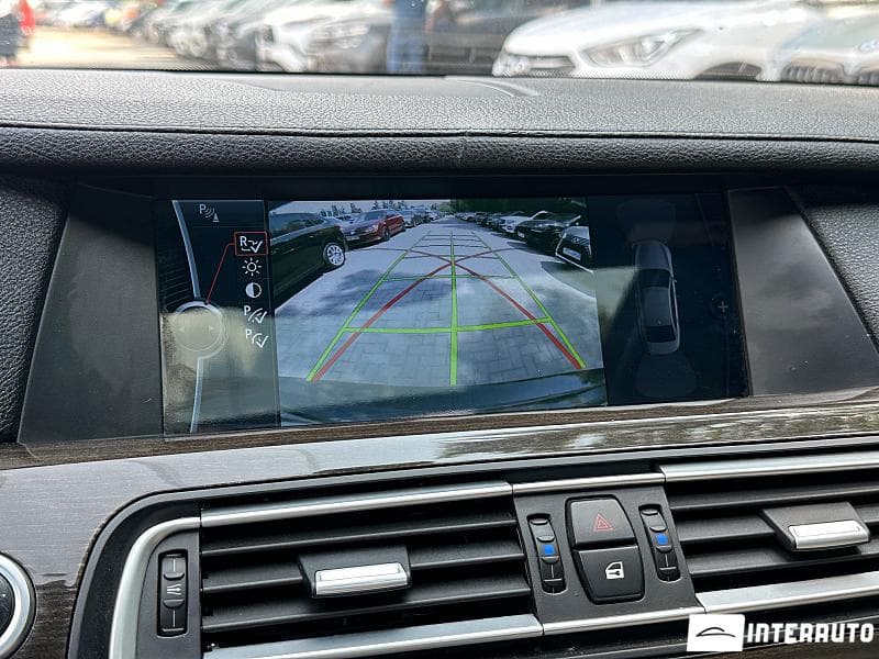 BMW 740 2011 — Миниатюра 14