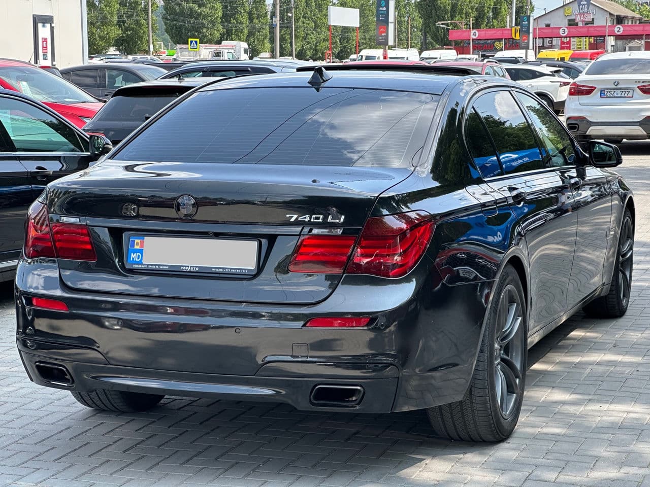 BMW 740 2011 — Миниатюра 2