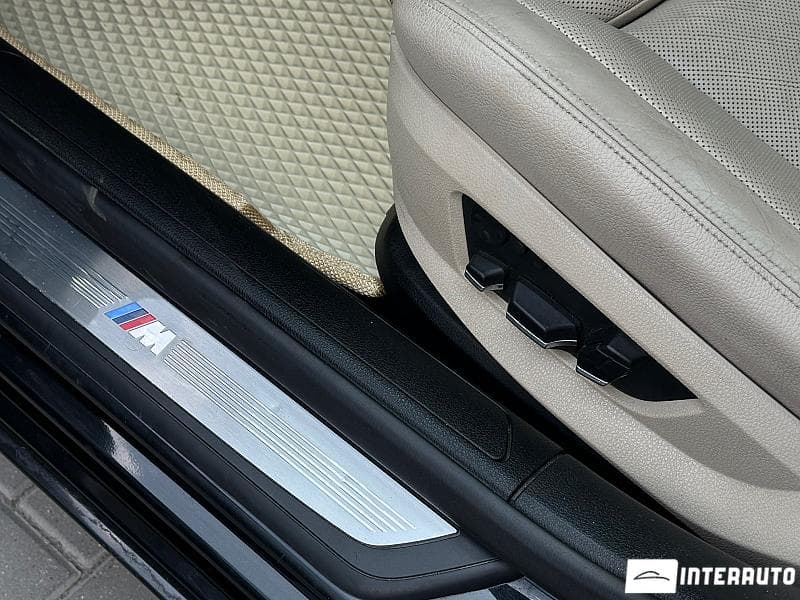 BMW 740 2011 — Миниатюра 9