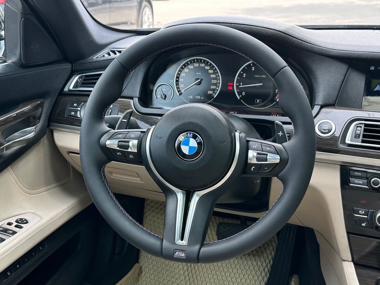 BMW 740 2011 — Миниатюра 11