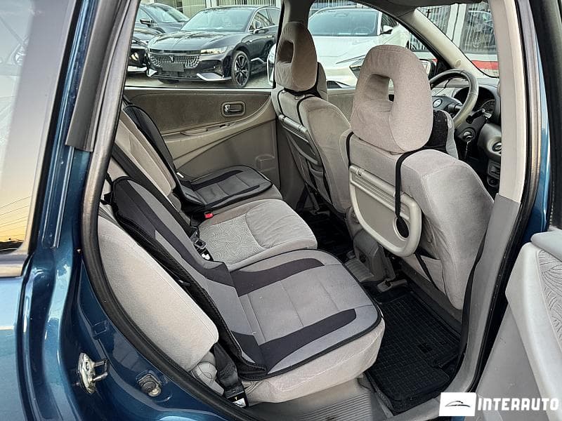 Nissan Almera Tino 2001 — Миниатюра 20