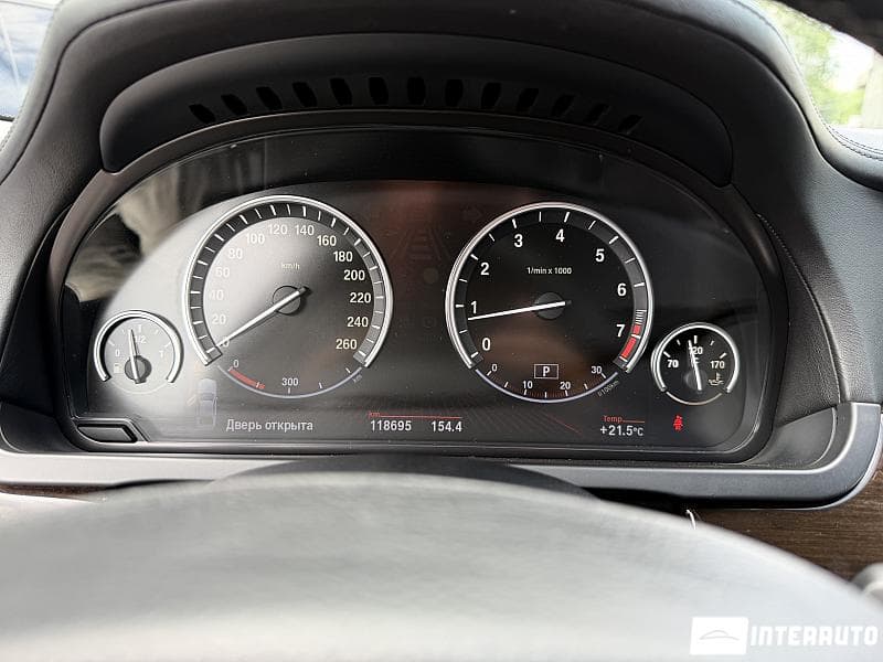 BMW 750 2009 — Миниатюра 9