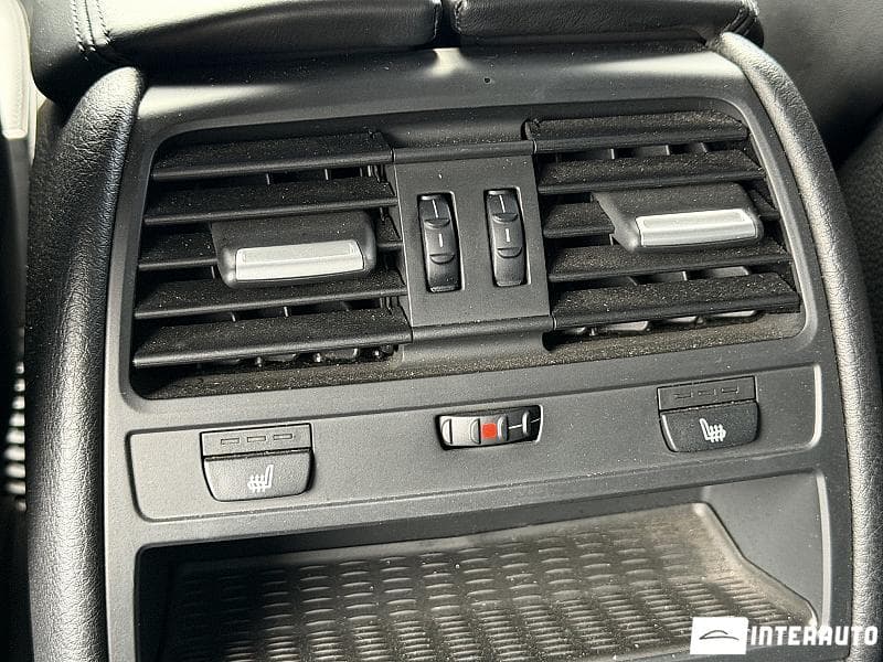 BMW 750 2009 — Миниатюра 15