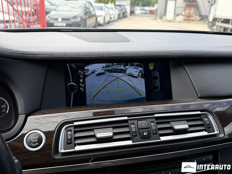 BMW 750 2009 — Миниатюра 10