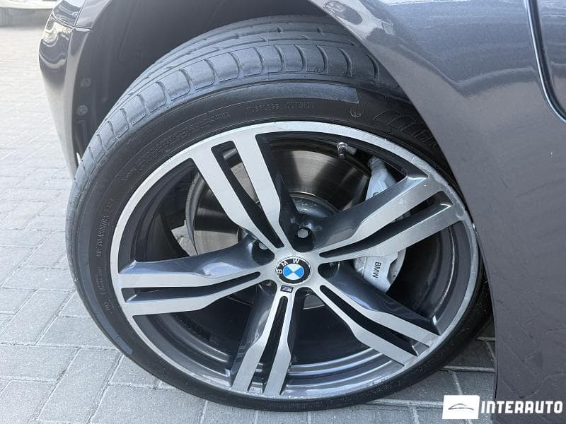 BMW 740e 2016 — Миниатюра 16