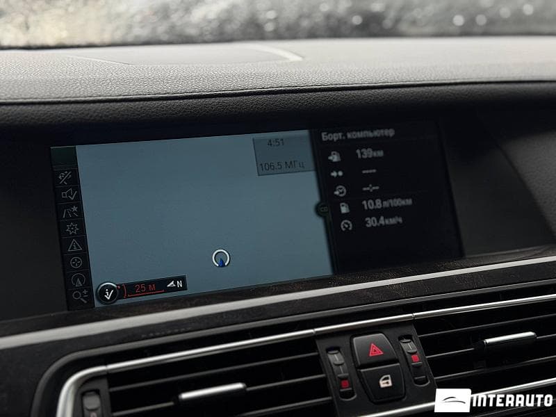 BMW 740 2011 — Миниатюра 9
