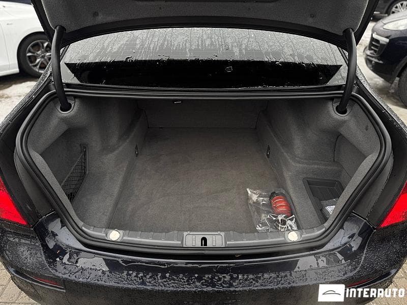 BMW 740 2011 — Миниатюра 20