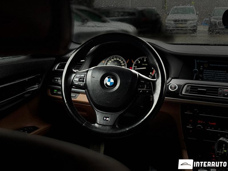 BMW 740 2011 — Миниатюра 7