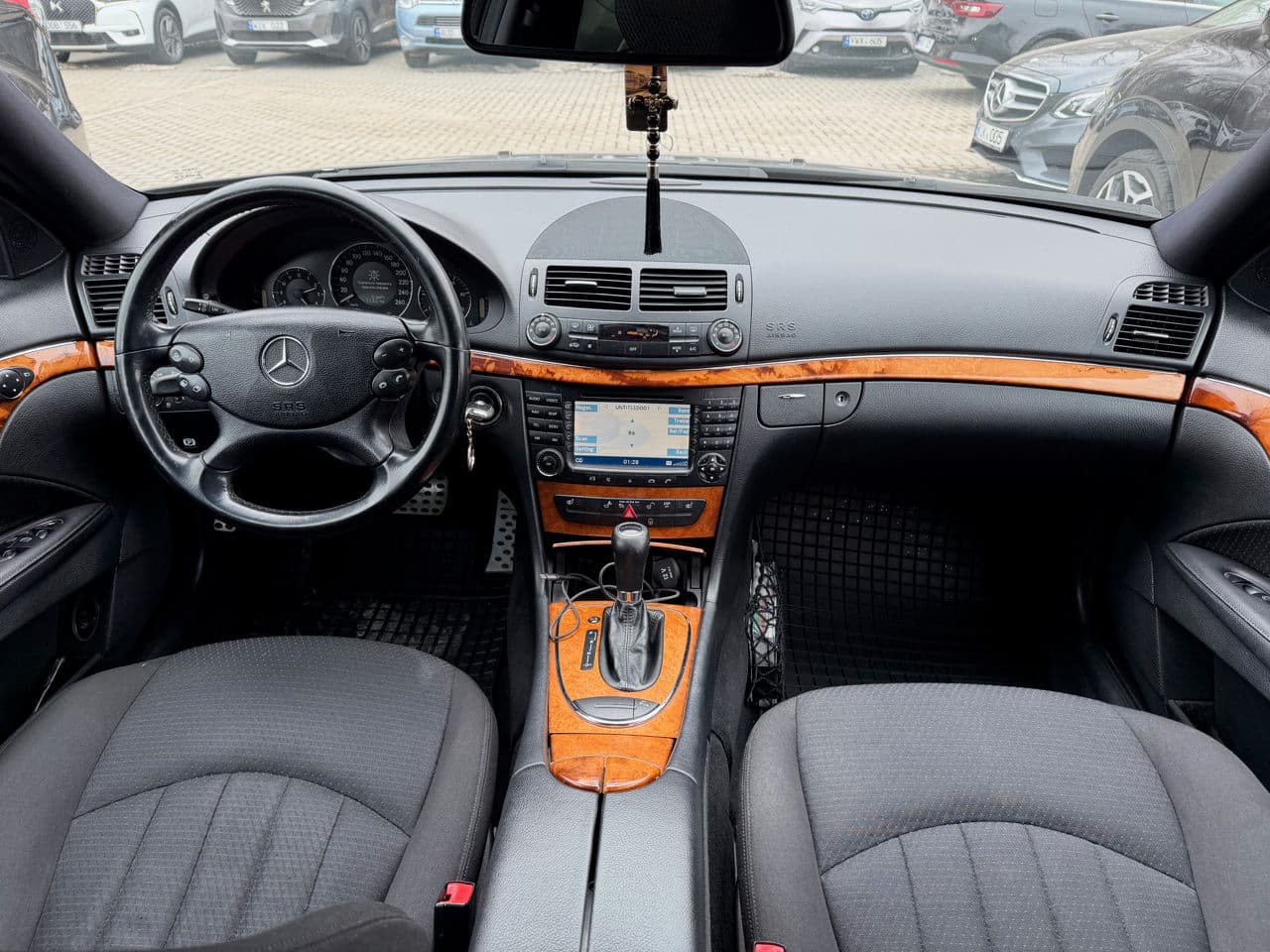 Mercedes E 220 2007 — Миниатюра 9