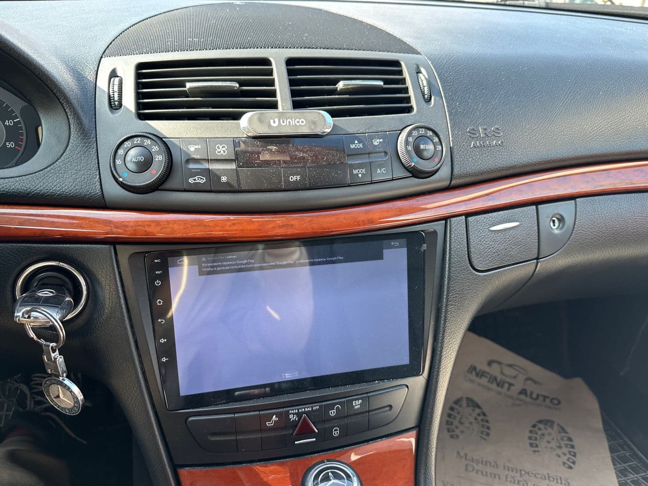 Mercedes E 220 2009 — Миниатюра 9
