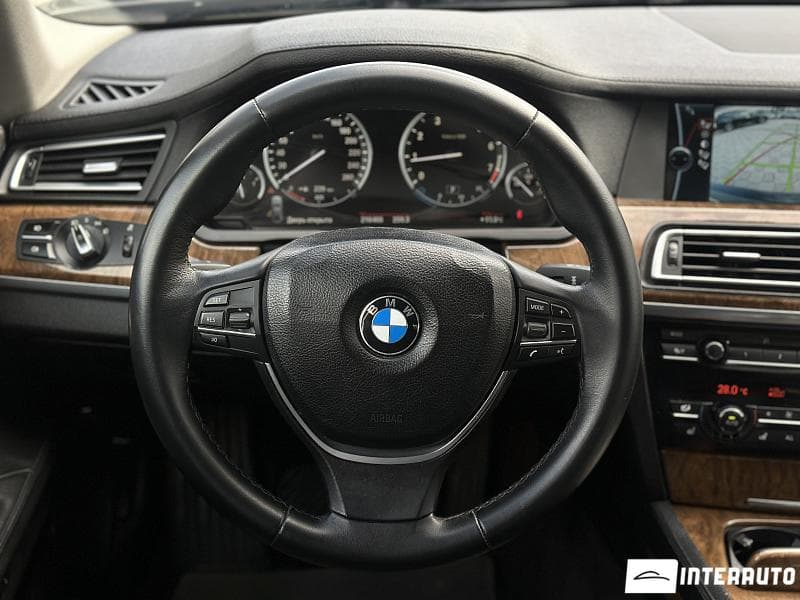 BMW 740 2010 — Миниатюра 11