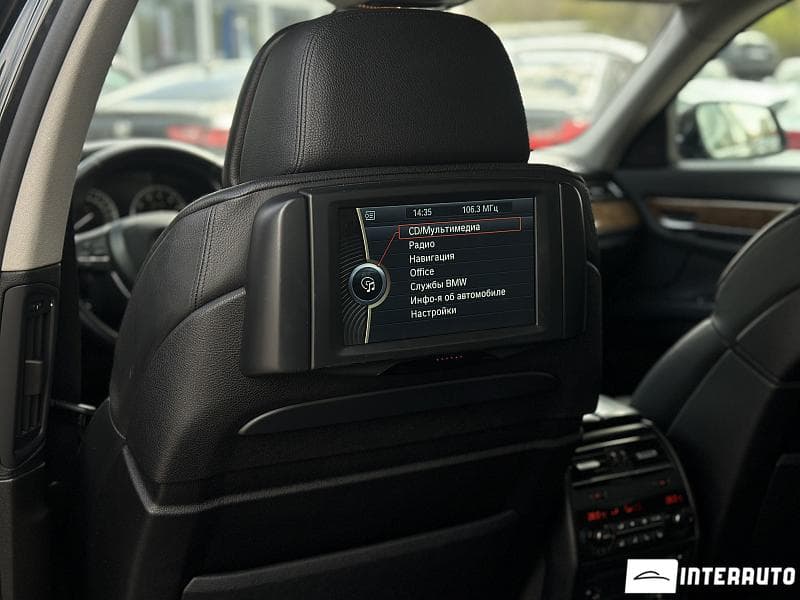 BMW 740 2010 — Миниатюра 19