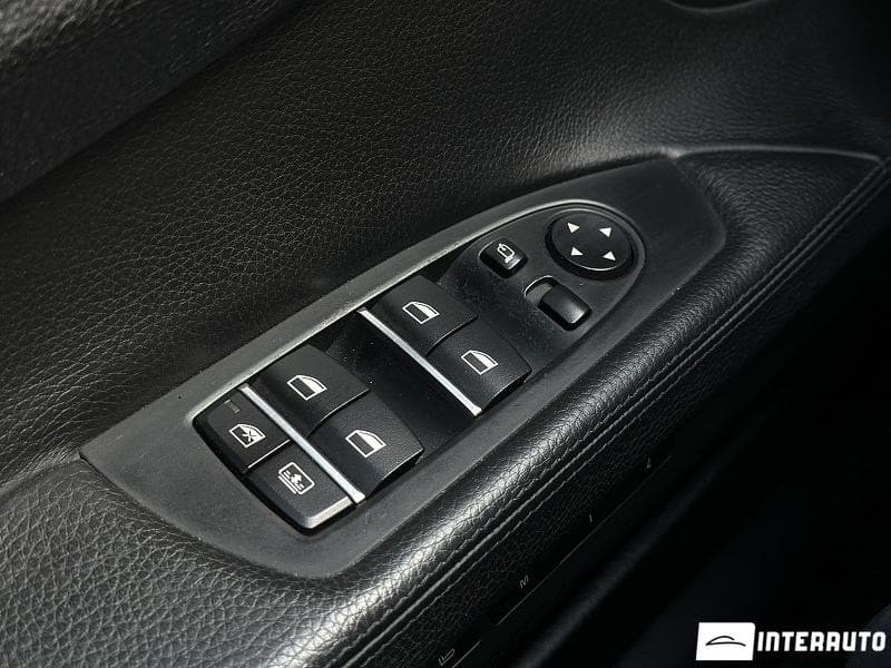 BMW 740 2010 — Миниатюра 7