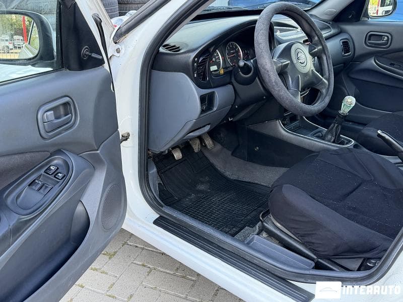 Nissan Almera 2005 — Миниатюра 5