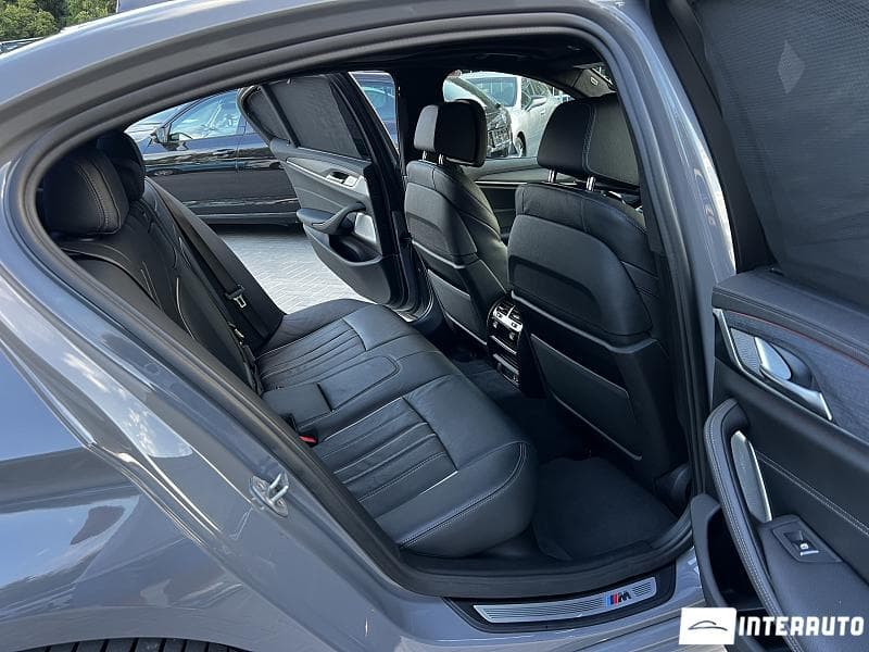 BMW M550i 2022 — Миниатюра 11