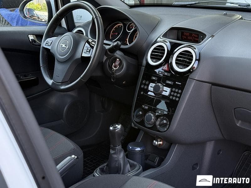 Opel Corsa 2011 — Миниатюра 9
