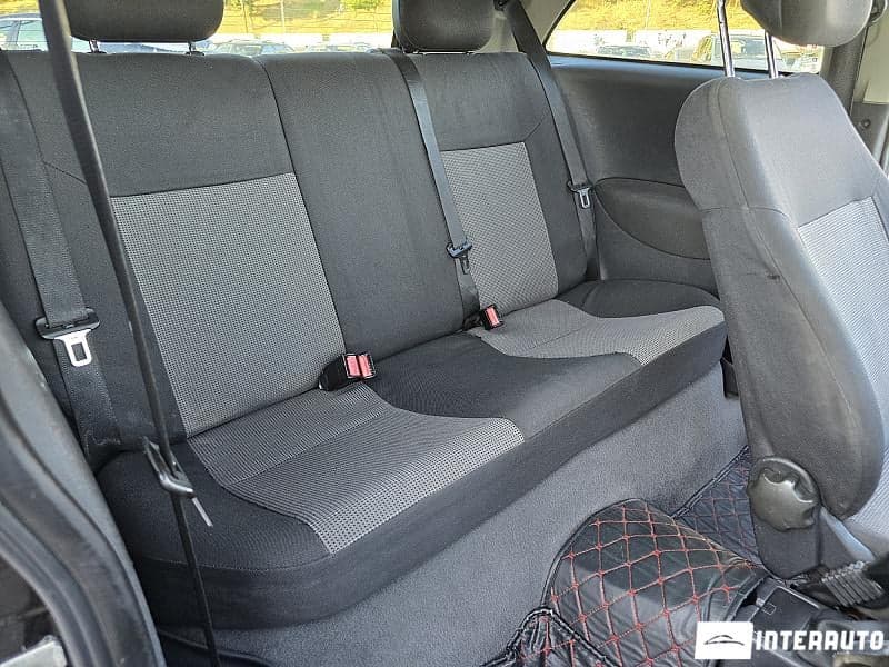 Opel Corsa 2004 — Миниатюра 12