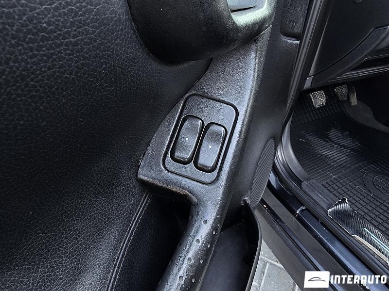 Opel Corsa 2004 — Миниатюра 13