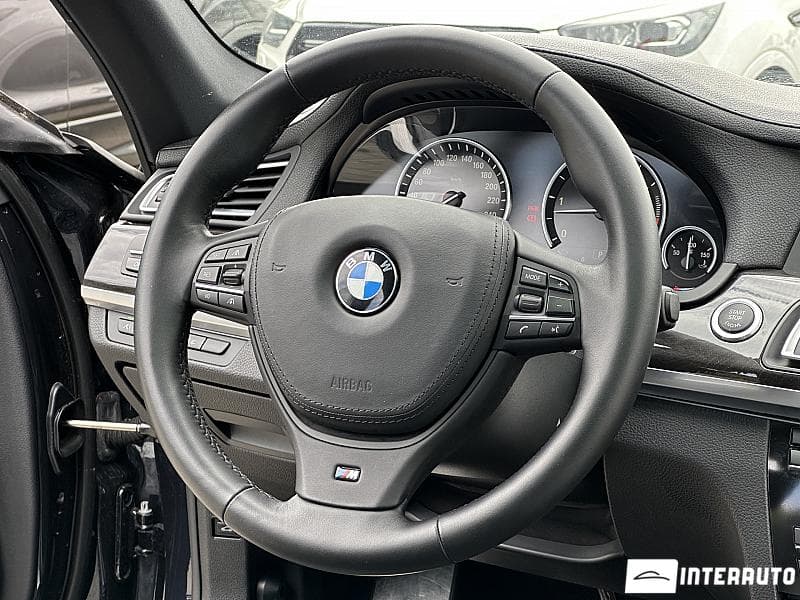 BMW 730 2009 — Миниатюра 7